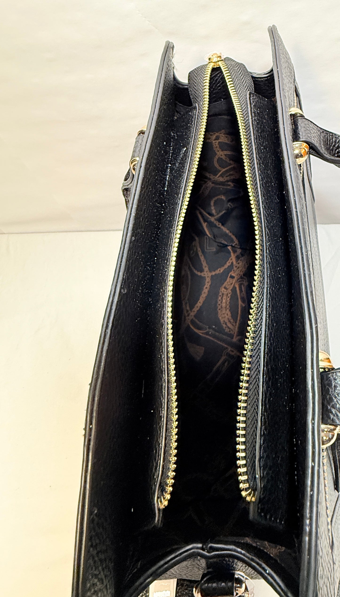 Black Leather Shoulder/Tote Bag W/Gold Toned Hardware. Double Tassle zip design