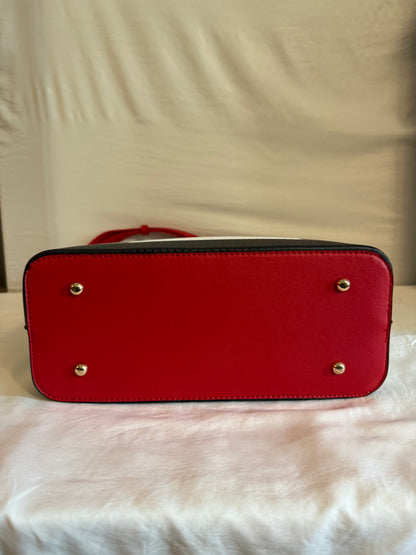 Plaid tote handbag with adjustable strap.