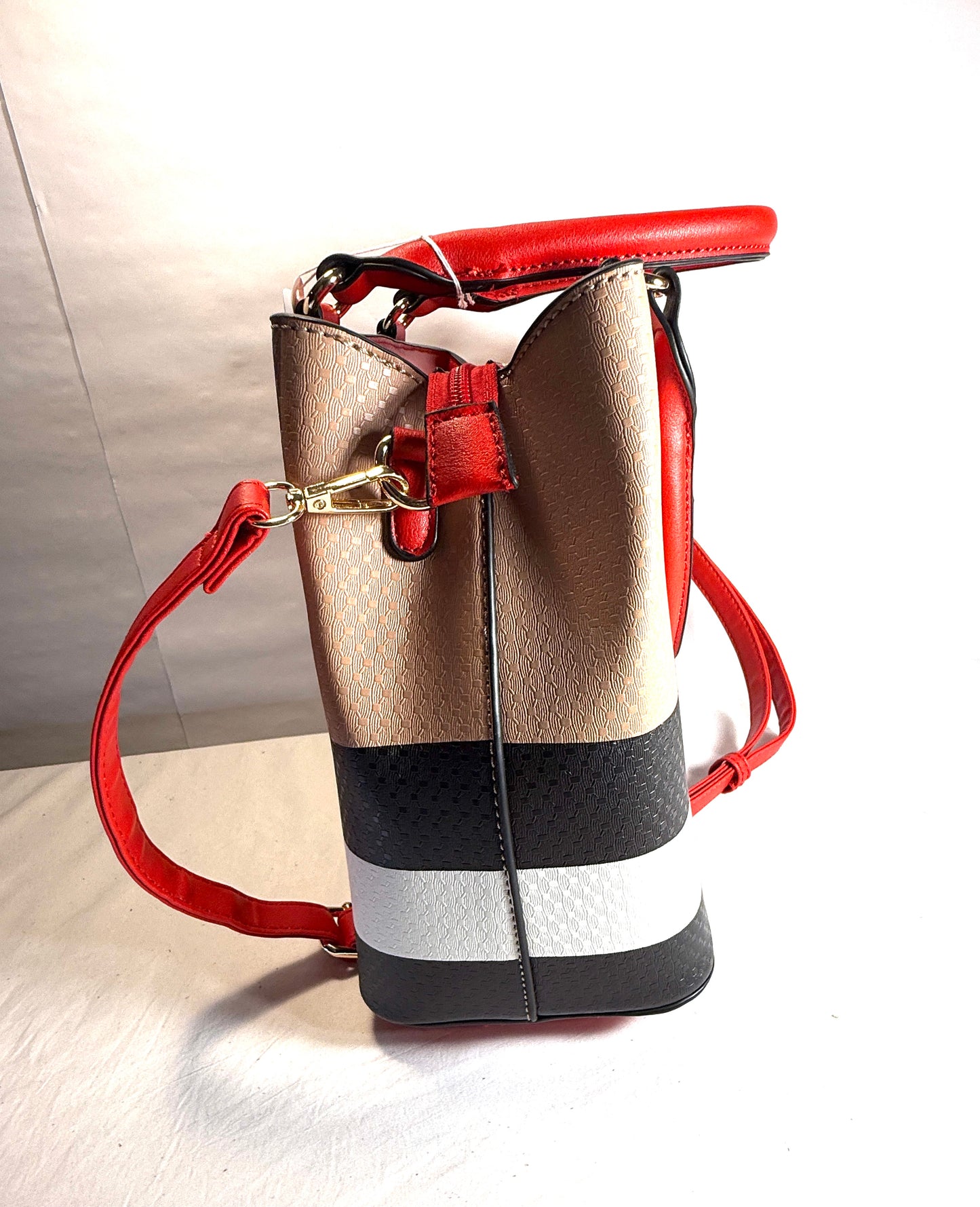 Plaid tote handbag with adjustable strap.