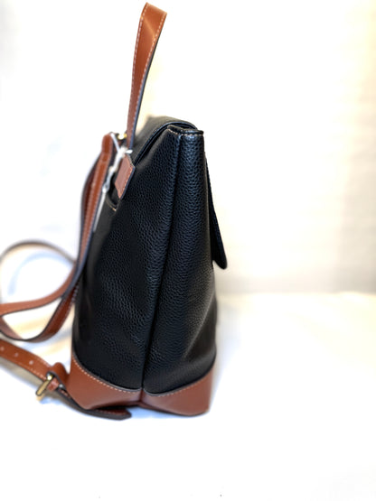 St John’s Bay Faux Leather Backpack purse. Rich black with brown outline
