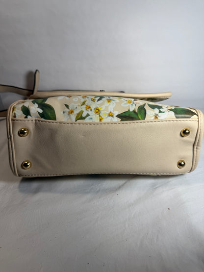 Pre-owned. Light women's small handbag with a blooming spring print. 