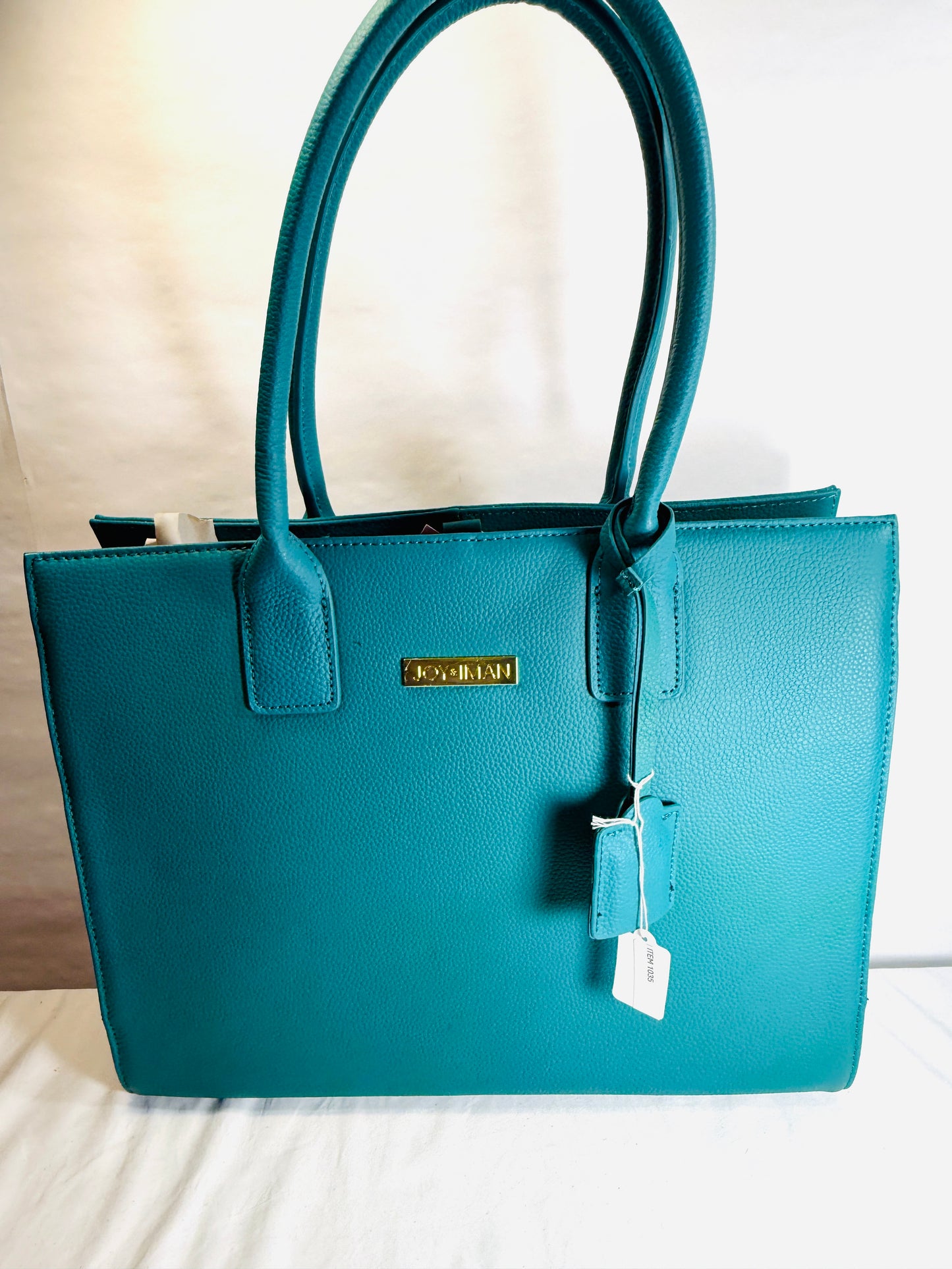 Joy and Iman Turquoise Leather Tote Purse w/Matching flashlight key chain and watch key chain..