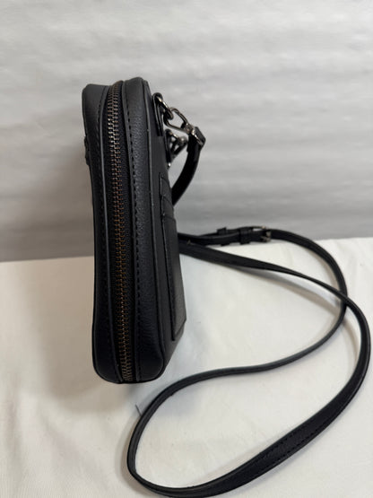 Zip Around Phone Crossbody bag w/ Adjustable Strap and Silver Hardware.