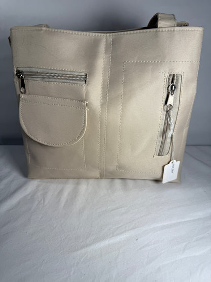 Pre-owned beige cargo style bag. 100% Polyester. Multi-Pocket Tote Bag